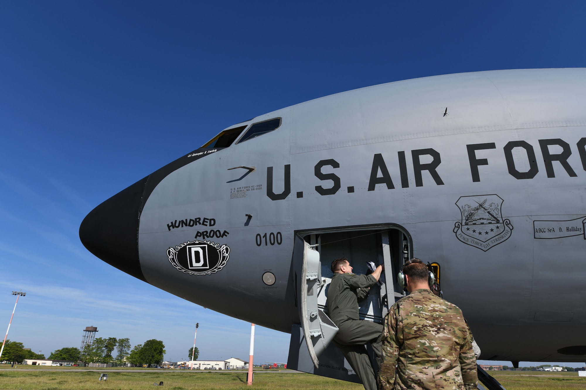 U.S. Air Force Col. Christopher Amrhein, 100th Air Refueling Wing commander, climbs the ladder to a KC-135 Stratotanker before his “fini flight” at RAF Mildenhall, England, May 15, 2019. Amrhein celebrated the end of his two-year command of the Bloody Hundredth by flying a KC-135 from RAF Mildenhall one last time. (U.S. Air Force photo by Senior Airman Luke Milano)