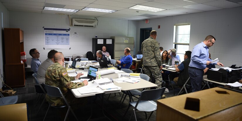 Inspectors working with the Defense Threat Reduction Agency and Naval Treaty Implementation Program organize various inspection teams to inspect perceived points of interest during the International Chemical Weapons Convention exercise May 15, 2019, at Naval Weapons Station Charleston, Joint Base Charleston, S.C. The Naval Treaty Implementation Program is staffed with civilian personnel with expertise in the planning, organization and execution of Navy and Marine Corps implementation, compliance and verification activities. The purpose of the exercise is to test the response of base assistance teams should the U.S. receive an international challenge inspection under the Chemical Weapons Convention Treaty. The Chemical Weapons Convention aims to eliminate an entire category of weapons of mass destruction by prohibiting the development, production, acquisition, stockpiling, retention, transfer or use of chemical weapons by States Parties. Exercises like these support the Department of Defense’s priority of reformation and full spectrum readiness in the face of new challenges. (U.S. Air Force photo by Senior Airman Cody R. Miller)