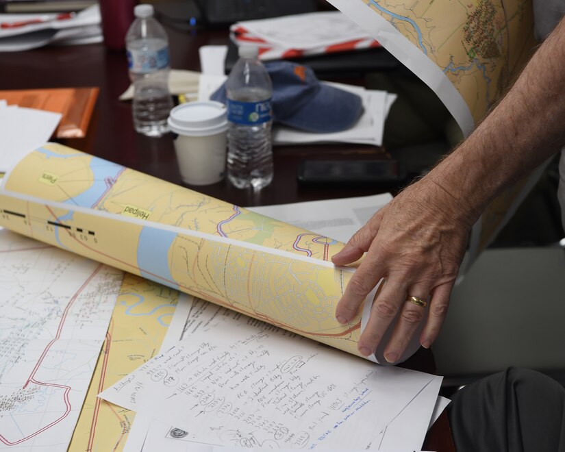 An inspector working for the Naval Treaty Implementation Program uses a map to find potential areas to inspect during the International Chemical Weapons Convention exercise May 16, 2019, at Naval Weapons Station Charleston, Joint Base Charleston, S.C. The Naval Treaty Implementation Program provides comprehensive arms control treaty support to Navy and Marine Corps commanding officers, program managers, senior leadership and decision-makers. The purpose of the exercise is to test the response of base assistance teams should the U.S. receive an international challenge inspection under the Chemical Weapons Convention Treaty. The Chemical Weapons Convention aims to eliminate an entire category of weapons of mass destruction by prohibiting the development, production, acquisition, stockpiling, retention, transfer or use of chemical weapons by States Parties. Exercises like these support the Department of Defense’s priority of reformation and full spectrum readiness in the face of new challenges. (U.S. Air Force photo by Senior Airman Cody R. Miller)
