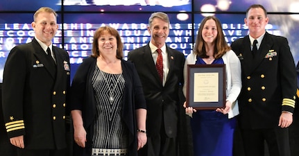 IMAGE: Katherine Mulreany receives the Leadership Award during the annual honorary awards ceremony, May 10. Standing left to right: NSWCDD Dam Neck Activity Commanding Officer Cmdr. Andrew Hoffman; NSWCDD Deputy Technical Director Angela Beach; U.S. Rep. Rob Wittman; Mulreany; and NSWCDD Commanding Officer Cmdr. Stephen ‘Casey’ Plew.