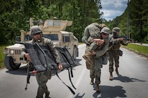 U.S. Marines with Combat Logistics Battalion 8, Combat Logistics Regiment 2, 2nd Marine Logistics Group, evacuate a casualty during a training exercise at Camp Lejeune, North Carolina, May 16, 2019.