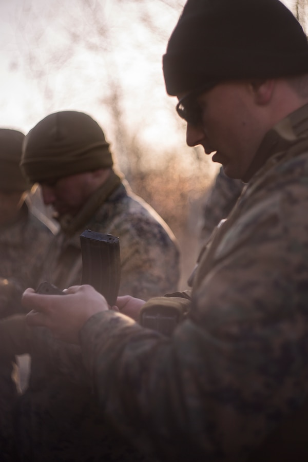 U.S. Marines and Sailors with 6th Air Naval Gunfire Liaison Company, Force Headquarter Group, Marine Forces Reserve, load blanks during exercise Maple Resolve in Camp Wainwright, Alberta, Canada, May 11, 2019. Maple Resolve is an annual exercise, 3-week multinational simulated war, hosted by the Canadian Army bringing NATO allies together from across the world to share and learn tactics while strengthening foreign military ties. (U.S. Marine Corps photo by Cpl. Niles Lee)
