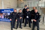 For National Police Week, DIA sent members of the police force to Ronald Reagan Washington National Airport to assist with the arrival of survivors and families of police officers from across the globe, including those from England. Photographed (from left to right) is DIA Police Officers Frankie Hill, Eric Plamp, Deondrey Ellis and Cory Jones.