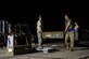 U.S. Air Force Airmen from the 355th Equipment Maintenance Squadron work together to build an [inert] GBU-12 Paveway II, an aerial laser-guided bomb, in a simulated deployed location on the flight line at Davis-Monthan Air Force Base, Ariz., April 9, 2019.
