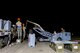 U.S. Air Force Airmen from the 355th Equipment Maintenance Squadron work together to build an [inert] GBU-12 Paveway II, an aerial laser-guided bomb, in a simulated deployed location on the flight line at Davis-Monthan Air Force Base, Ariz., April 9, 2019.