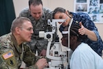 U.S. service members perform postoperative checks on the last ophthalmology center patient during New Horizons exercise 2019 at Port Mourant, Guyana, May 16, 2019. The ophthalmology clinic was established to provide aid to the Guyanese population by screening and selecting patients to receive cataract surgery in support of New Horizons 2019. The New Horizons exercise 2019 provides U.S. military members an opportunity to train for an overseas deployment and the logistical requirements it entails. The exercise promotes bilateral cooperation by providing opportunities for U.S. and partner nation military engineers, medical personnel and support staff to work and train side by side.