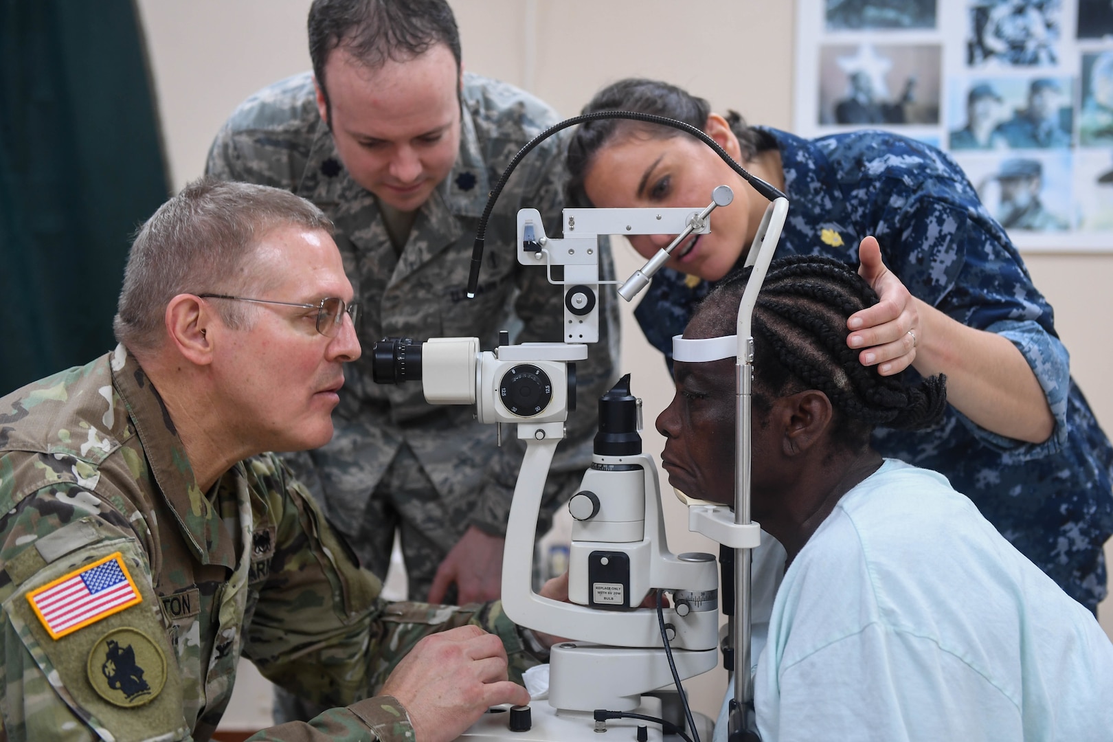 U.S. service members perform postoperative checks on the last ophthalmology center patient during New Horizons exercise 2019 at Port Mourant, Guyana, May 16, 2019. The ophthalmology clinic was established to provide aid to the Guyanese population by screening and selecting patients to receive cataract surgery in support of New Horizons 2019. The New Horizons exercise 2019 provides U.S. military members an opportunity to train for an overseas deployment and the logistical requirements it entails. The exercise promotes bilateral cooperation by providing opportunities for U.S. and partner nation military engineers, medical personnel and support staff to work and train side by side.