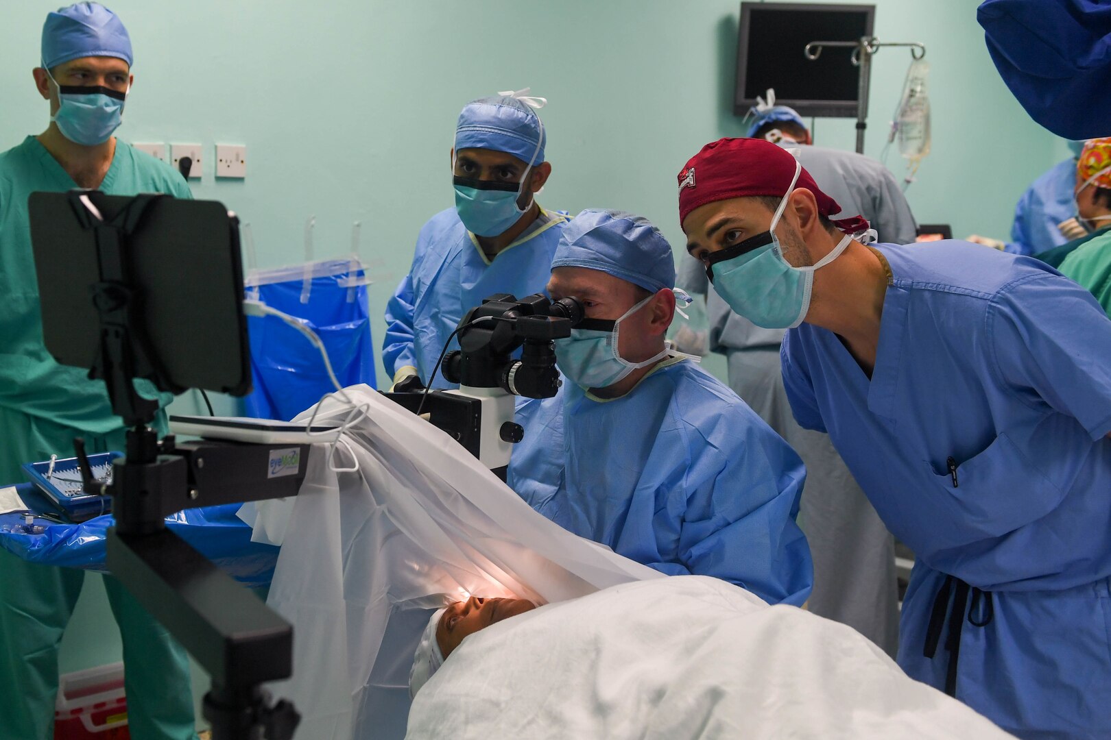 U.S. service members observe a cataract surgery during New Horizons exercise 2019 at Port Mourant, Guyana, May 6, 2019. The New Horizons exercise 2019 provides U.S. military members an opportunity to train for an overseas deployment and the logistical requirements it entails. The exercise promotes bilateral cooperation by providing opportunities for U.S. and partner nation military engineers, medical personnel and support staff to work and train side by side.