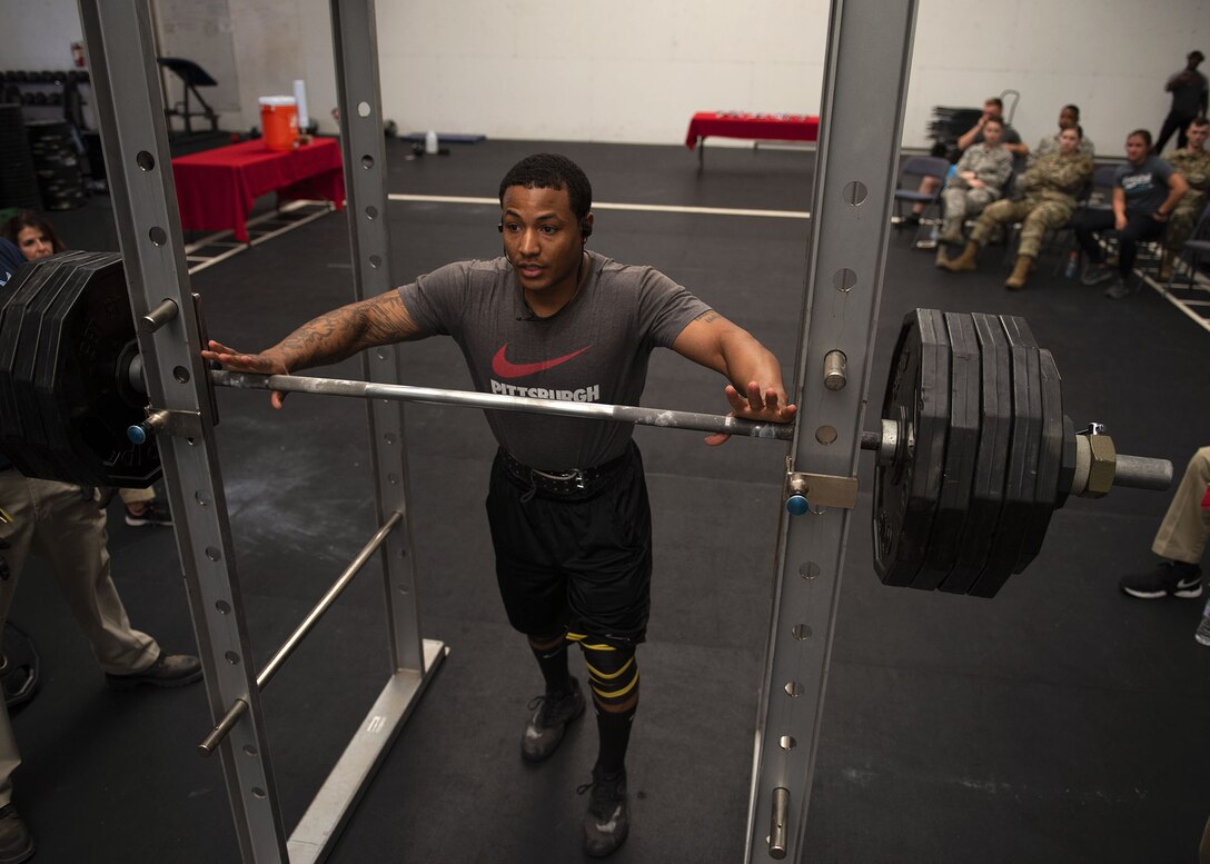 Airman 1st Class Jeremy Conway, 63rd Operation Support Squadron aircrew flight equipment member, prepares to squat during the Luke Powerlifting Competition, May 17, 2019, at Luke Air Force Base, Ariz.