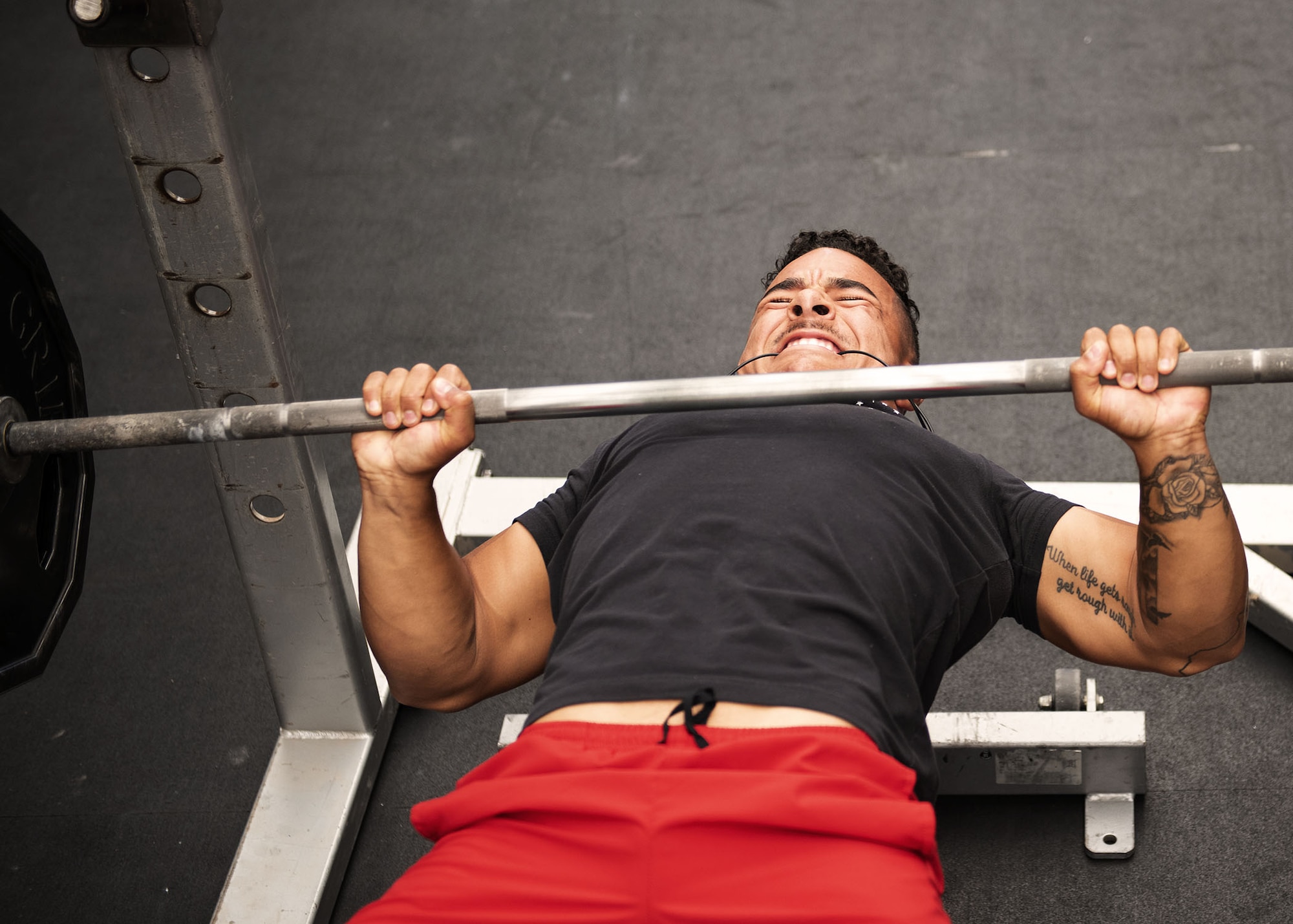 Airman 1st Class Braxton Love, 310th Aircraft Maintenance Unit assistant dedicated crew chief, bench presses during the Luke Powerlifting Competition, May 17, 2019, Luke Air Force Base.