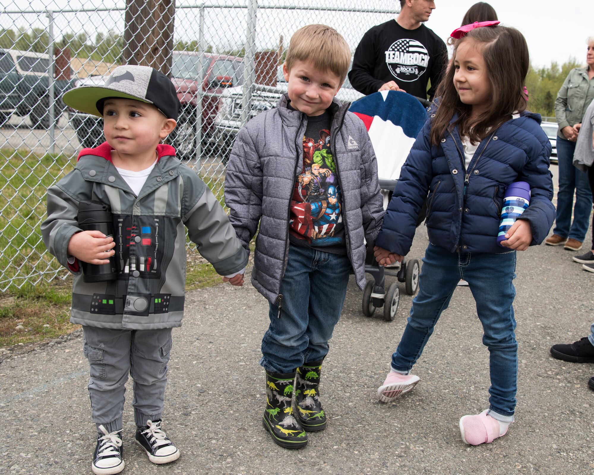 The 673d Security Forces Squadron family members visit various defender-guarded facilities at Joint Base Elmendorf-Richardson, Alaska, May 16, 2019. In commemoration of Police Week, multiple demonstrations and activities were organized to highlight defender-style training and work conduct which included a defender family day tour.