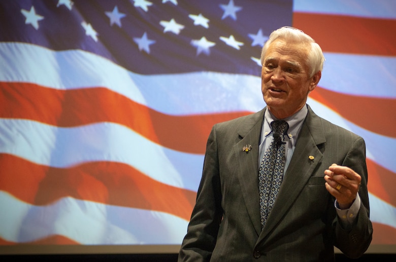 U.S. Air Force retired Lt. Col. Barry Bridger spoke to Team Offutt during commander’s update briefing May 16, 2019, at Offutt Air Force Base, Nebraska. Bridger was shot down Jan. 23, 1967, by a surface-to-air missile over Son Tay, North Vietnam, only to be captured later by the North Vietnamese and imprisoned at Hoa Loa Prison, also known to the POWs as the Hanoi Hilton.