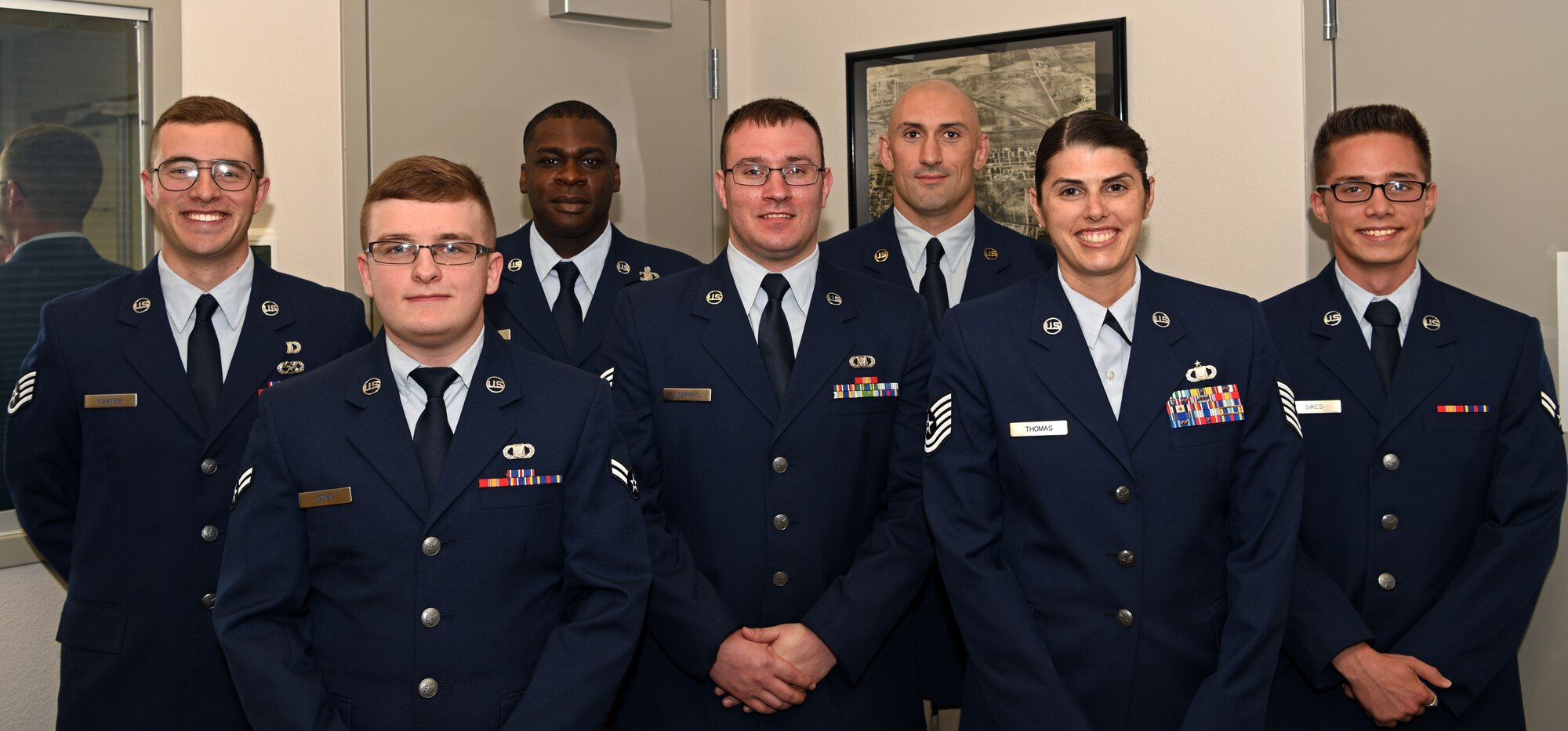 Goodfellow Command Post team gathered for a group photo at the Norma Brown building at Goodfellow Air Force Base May 20, 2019. The base command post is the central command point for mission operations.