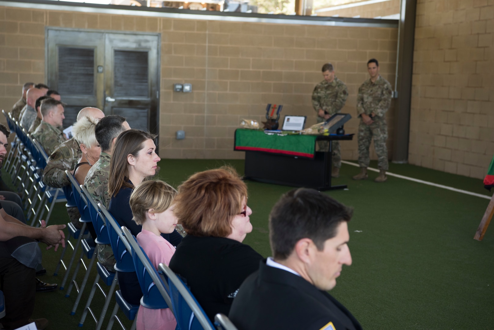 Family and friends of Senior Airman Bradley Smith, a fallen Special Tactic Airman, attend a dedication ceremony in his honor April 19 at Joint Base San Antonio-Lackland Medina Annex, Texas.