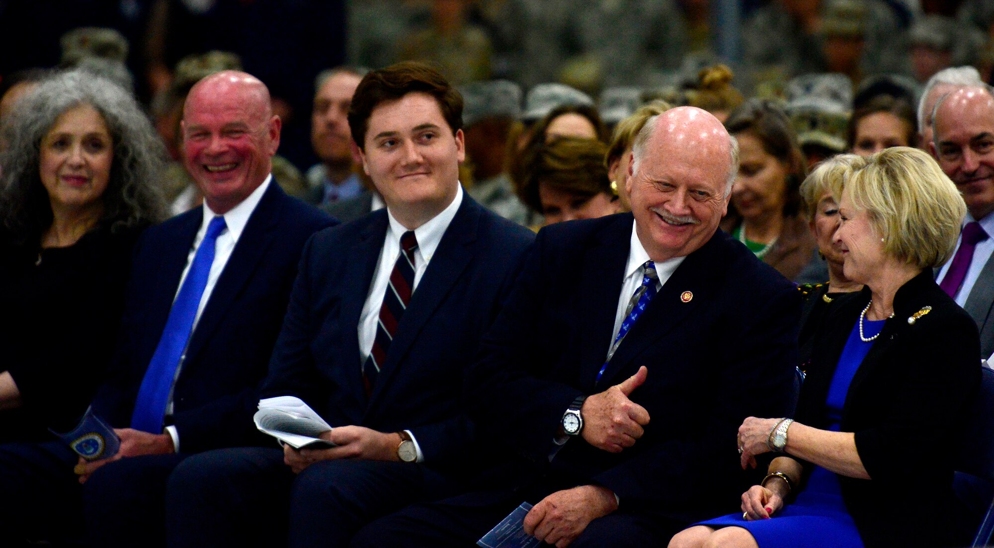 Jay Hone, spouse of Secretary of the Air Force Heather Wilson, shares a moment with Dawn Goldfein, spouse, Air Force Chief of Staff Gen. David L. Goldfein, during the SECAF's farewell ceremony at Joint Base Andrews, Md., May 21, 2019. (U.S. Air Force photo by Staff Sgt. Rusty Frank)