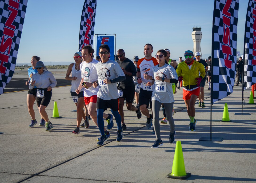 Competitors take off at the start of the Run with History Half Marathon, 10k and 5k at Edwards Air Force Base, Calif., May 18. (U.S. Air Force photo by Giancarlo Casem)