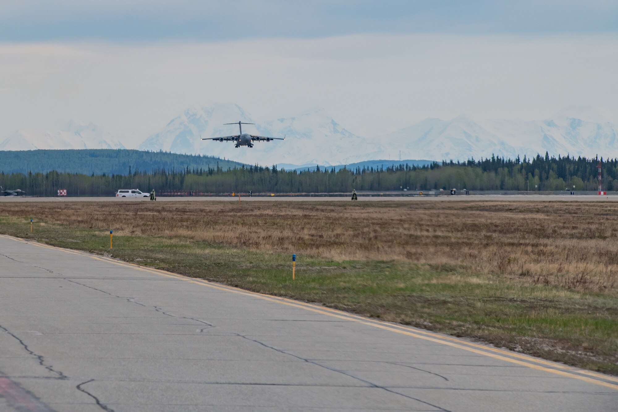 A U.S. Air Force C-17 Globemaster III assigned to Joint Base Charleston, South Carolina, prepares to land during exercise Northern Edge, May 14, 2019, at Eielson Air Force Base, Alaska.