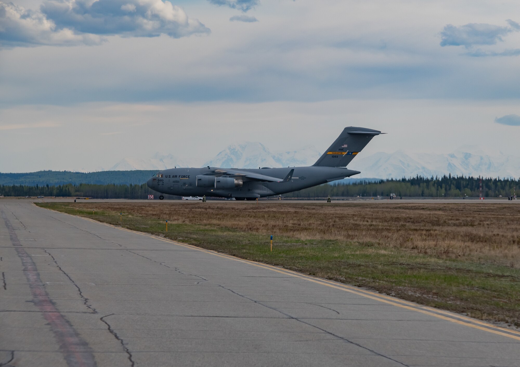 A U.S. Air Force C-17 Globemaster III assigned to Joint Base Charleston, South Carolina, prepares to land during exercise Northern Edge, May 14, 2019, at Eielson Air Force Base, Alaska.