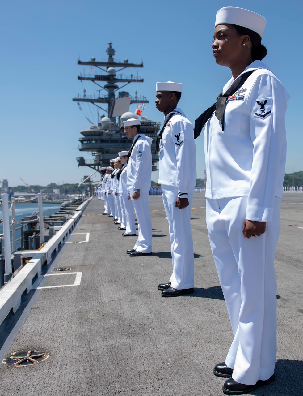 YOKOSUKA, Japan (May. 22, 2019) Sailors man the rails as the Navy’s forward-deployed aircraft carrier USS Ronald Reagan (CVN 76), as the ship departs Commander, Fleet Activities Yokosuka for underway operations. Ronald Reagan provides a combat-ready force, which protects and defends the collective maritime interests of the U.S. and its allies and partners in the Indo-Pacific region.