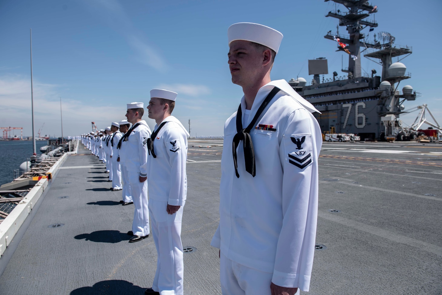 YOKOSUKA, Japan (May. 22, 2019) Sailors man the rails as the Navy’s forward-deployed aircraft carrier USS Ronald Reagan (CVN 76), as the ship departs Commander, Fleet Activities Yokosuka for underway operations. Ronald Reagan provides a combat-ready force, which protects and defends the collective maritime interests of the U.S. and its allies and partners in the Indo-Pacific region.