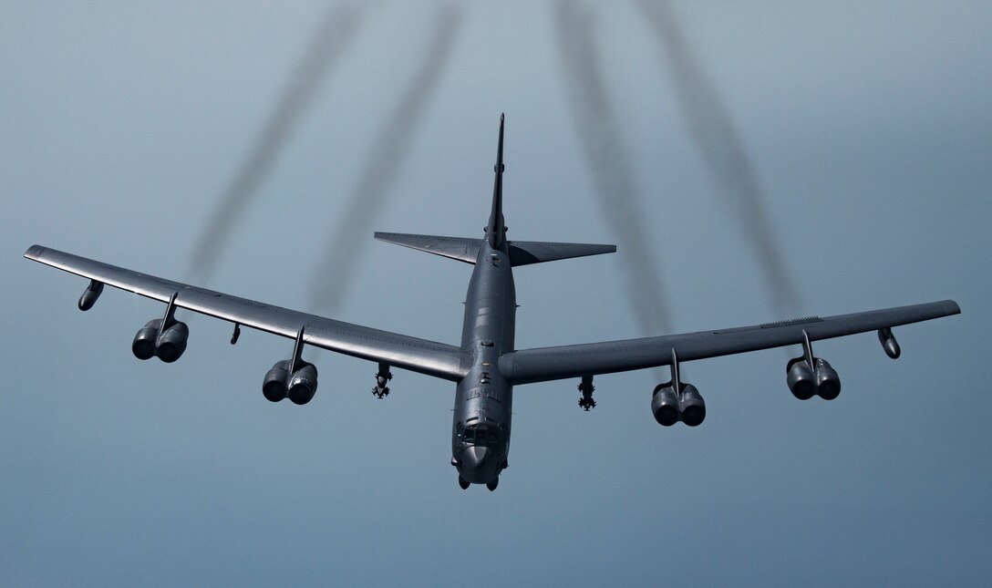 A U.S. B-52H Stratofortress prepares to join with Qatar Emiri Air Force (QEAF) Mirage 2000s and U.S. F-35A Lightning IIs to fly in formation over Southwest Asia, May 21, 2019. This flight was conducted to continue building military-to-military relationships with the QEAF. The B-52H is part of the Bomber Task Force deployed to the U.S. Central Command area of responsibility to defend U.S. forces and interests in the region. (U.S. Air Force photo by Senior Airman Keifer Bowes)