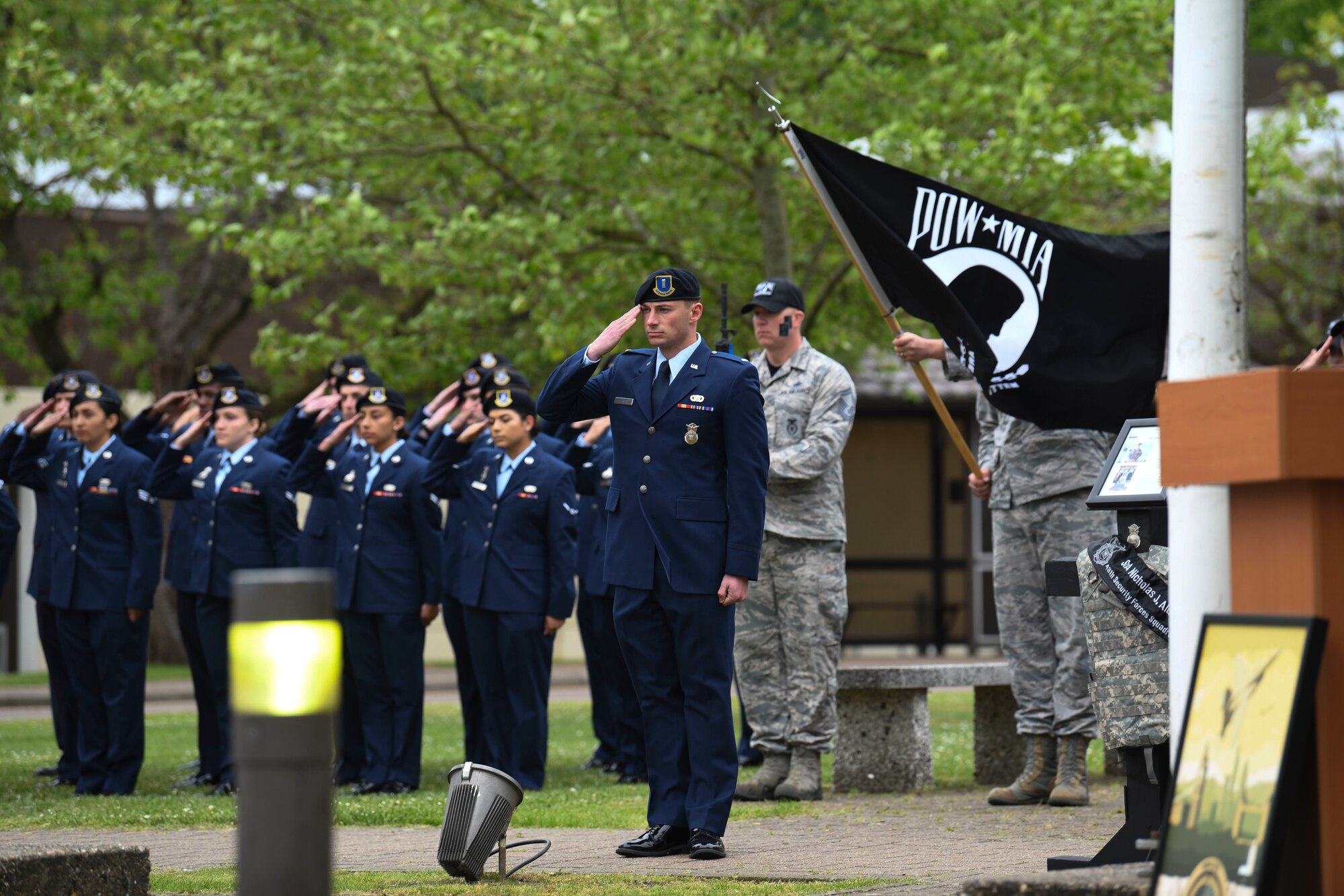 Members of the 100th and 48th Security Forces Squadrons salute for fallen police men and women during National Police Week at RAF Lakenheath, England, May 17, 2019. National Police Week was designated as a time to honor law enforcement members who made the ultimate sacrifice in the line of duty. (U.S. Air Force photo by Senior Airman Alexandria Lee)