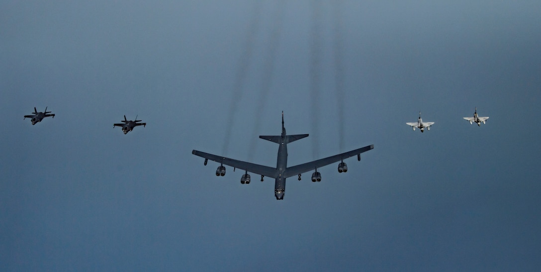 Qatar Emiri Air Force Mirage 2000s, a U.S. B-52H Stratofortress, and U.S. F-35A Lightning IIs fly in formation over Southwest Asia, May 21, 2019. This flight was conducted to continue building military-to-military relationships with the QEAF. The B-52H is part of the Bomber Task Force deployed to the U.S. Central Command area of responsibility to defend American forces and interests in the region. (U.S. Air Force photo by Senior Airman Keifer Bowes)