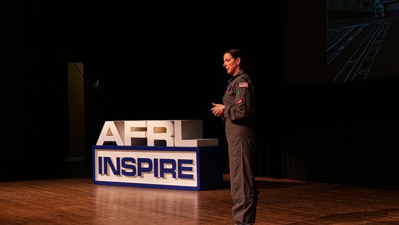 Capt. Sarah Woody, deputy course director for the Critical Air Transport (CCAT) initial course at the United States Air Force School of Aerospace Medicine, presents her Inspire talk, entitled, “Thought for Food.” (U.S. Air Force photo/Keith Lewis)