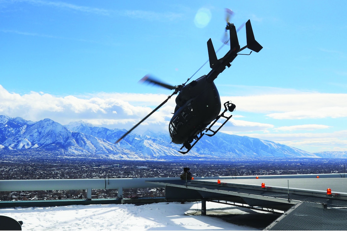 A UH-72 Lakota takes off from the helipads of the Wells Fargo building in Salt Lake City