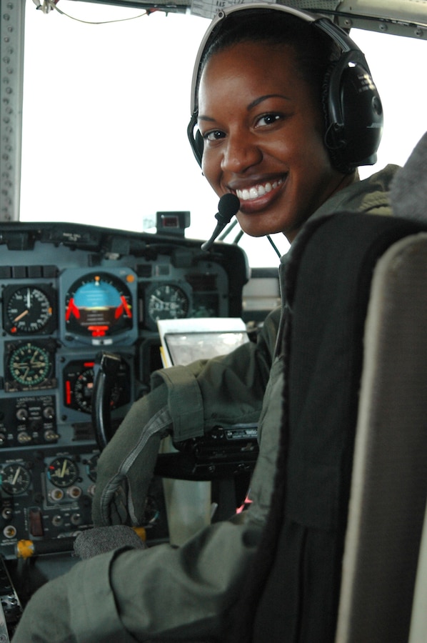 OAHU, Hawaii (January, 2006) Lt. j.g. Jeanine Menze, a Coast Guard C-130 Hercules aircraft pilot stationed at Coast Guard Air Station Barbers Point, Oahu, Hawaii, proudly sits at the controls of one of the 27 C-130's currently used throughout the service. USCG photo by PA2 Jennifer Johnson.