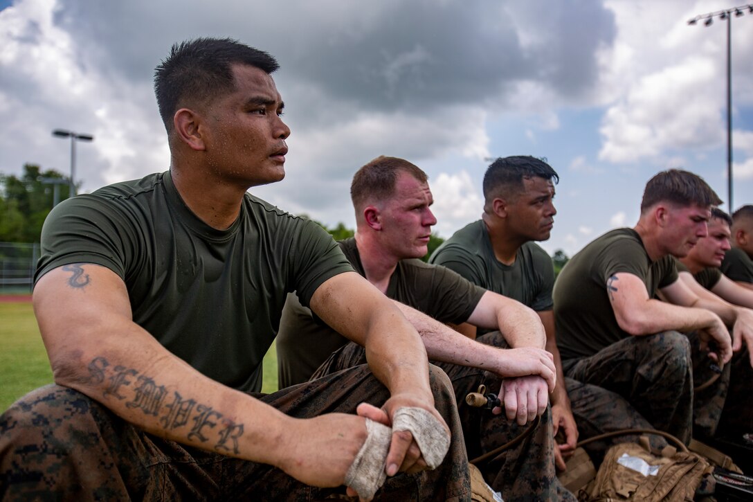 U.S. Marines with Martial Arts Instructor Course 1-19 receive a brief after a combat conditioning exercise at Naval Air Station Joint Reserve Base New Orleans on May 20, 2019. To increase readiness and to support the total force, Reserve and active Marines with Marine Forces Reserve participate in the Martial Arts Instructor Course.  (U.S. Marine Corps photo by Lance Cpl. Jose Gonzalez)