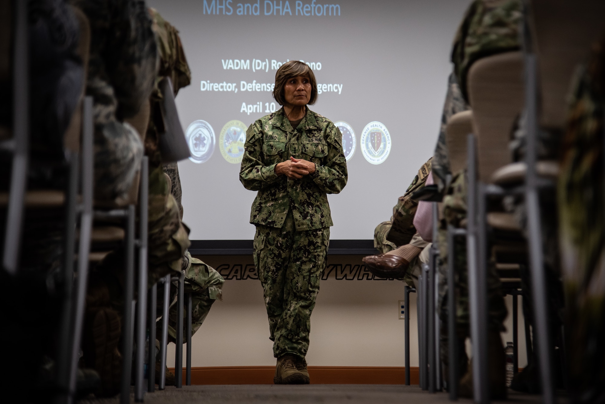 Vice Adm. Raquel Bono, Defense Health Agency director, discusses her vision for the transition of all CONUS MTFs to the authority, direction, and control of the DHA on Oct. 1, during a town hall with the 20th Medical Group, Shaw Air Force Base, S.C., May 1, 2019.