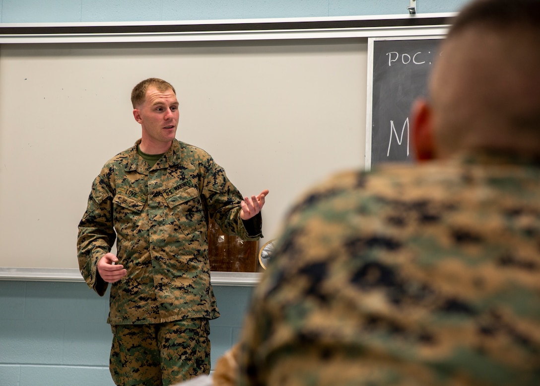 U.S. Marine Corps Sgt. Daultin Love, a ground support equipment instructor with the Center for Naval Aviation Technical Training Unit Jacksonville, Naval Air Station Jacksonville, gives a class during a Martial Arts Instructor Course at Naval Air Station Joint Reserve Base New Orleans on May 20, 2019. To increase readiness and to support the total force, Reserve and active Marines with Marine Forces Reserve participate in the Martial Arts Instructor Course.  (U.S. Marine Corps photo by Lance Cpl. Jose Gonzalez)