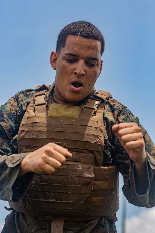 U.S. Marine Corps Cpl. Luis Alicea, a ground support equipment mechanic with Marine Aircraft Group 49, 4th Marine Aircraft Wing, Marine Forces Reserve, participates in a combat conditioning exercise at Naval Air Station Joint Reserve Base New Orleans on May 20, 2019. To increase readiness and to support the total force, Reserve and active Marines with MARFORRES participate in the Martial Arts Instructor Course.  (U.S. Marine Corps photo by Lance Cpl. Jose Gonzalez)