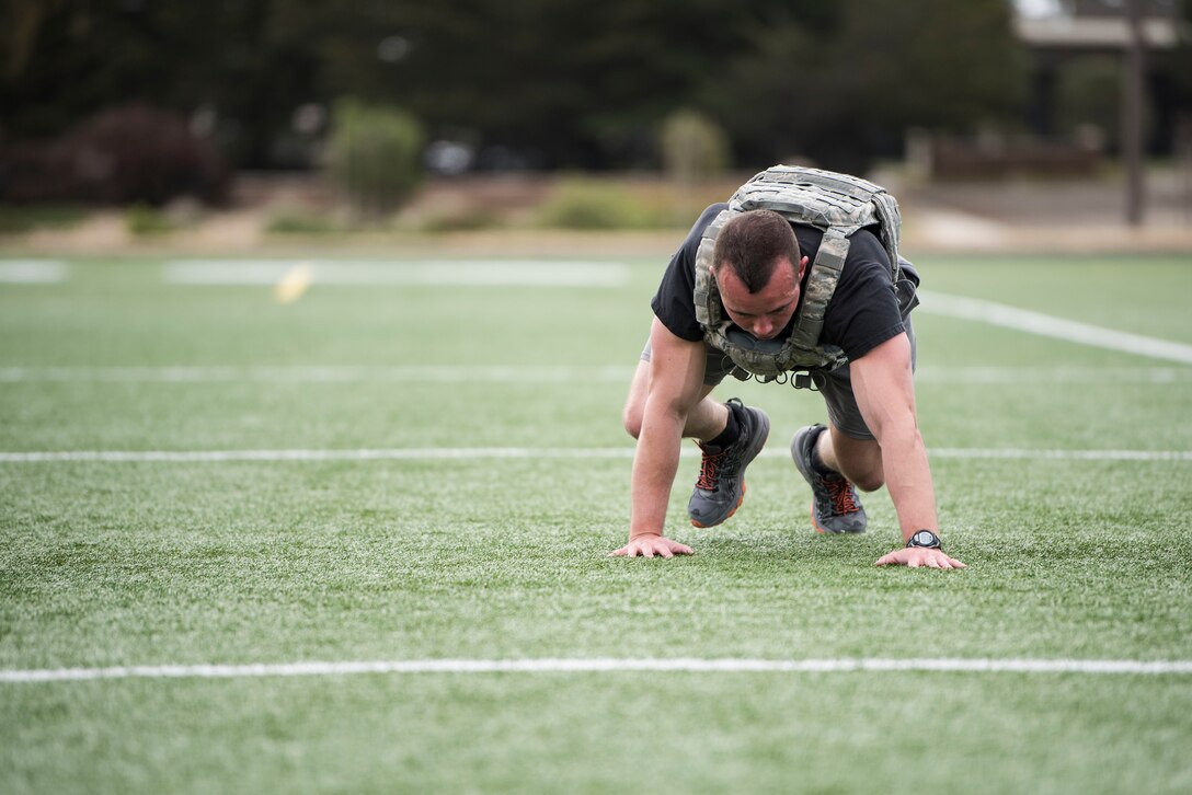 2nd. Lt Christopher Sokolowski, 30th Security Forces Squadron defender, performs a bear crawl during the Police Week Warrior Workout of the Day Challenge May 16, 2019, at Vandenberg Air Force Base, Calif. The 30th SFS hosted not only the Warrior WOD Challenge, but also a pistol competition, Jail and Bail, Ruck to Remember, Police Expo and candlelight vigil throughout Police Week to honor the men and women of law enforcement. (U.S. Air Force photo by Airman 1st Class Hanah Abercrombie)