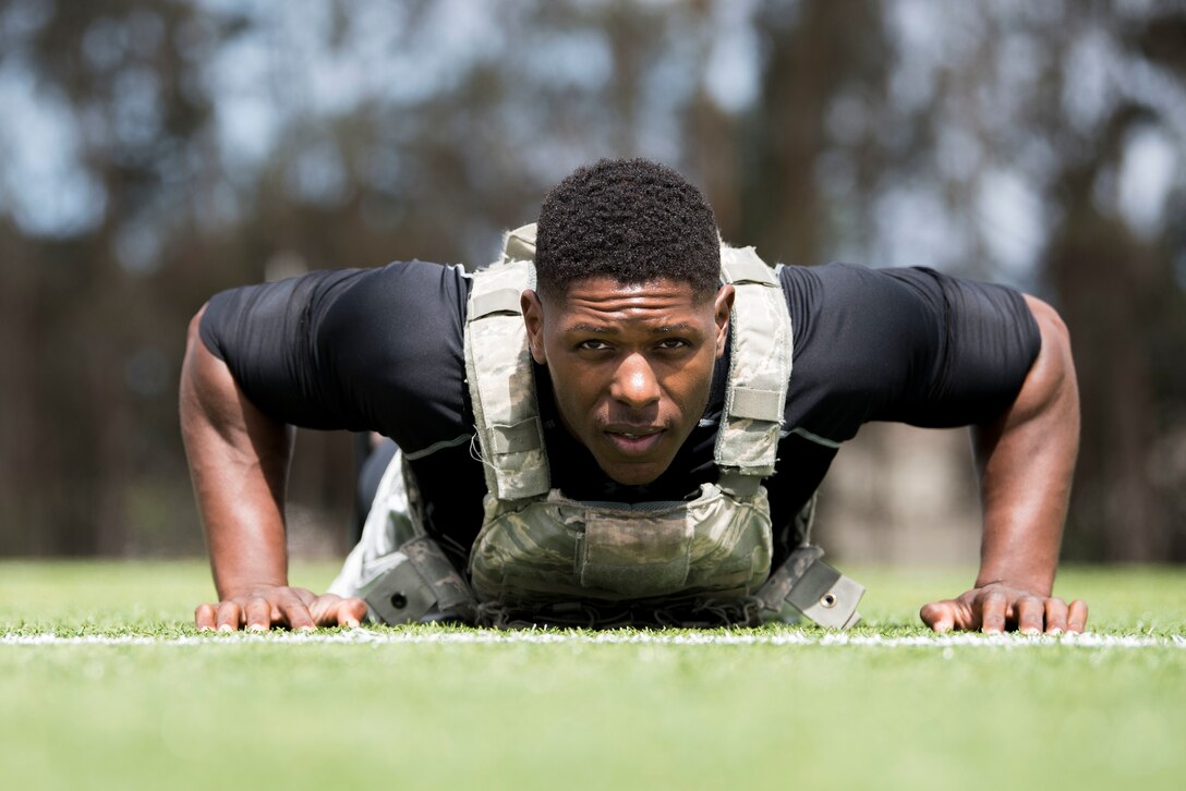 1st Lt. Xavier Jones, 17th Training Squadron test team project manager, performs pushups during the Police Week Warrior  Workout of the Day Challenge May 16, 2019, at Vandenberg Air Force Base, Calif. In 1962, President John F. Kennedy signed a proclamation that designated May 15 as Peace Officers Memorial Day and the week in which that date falls as Police Week. (U.S. Air Force photo by Airman 1st Class Hanah Abercrombie)