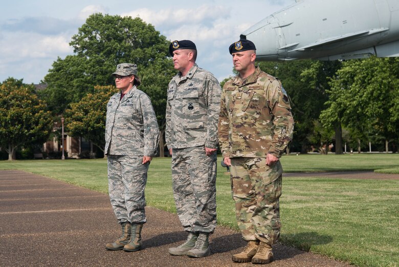 Airmen stand at attention during the closing ceremony of Police Week at Joint Base Langley-Eustis, Virginia, May 17, 2019. During Police Week, Security Forces teamed up with other policing agencies in the community to host events aimed at community outreach. (U.S. Air Force photo by Airman 1st Class Marcus M. Bullock)