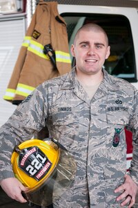 U.S. Air Force Staff Sgt. Michael Ginikos, crew chief in the fire department at the 121st Air Refueling Wing, stands for a portrait May 5, 2019, at Rickenbacker Air National Guard Base, Ohio. Ginikos won the 2018 Chief Albert Fitzpatrick Award for Air National Guard Firefighter of the Year.