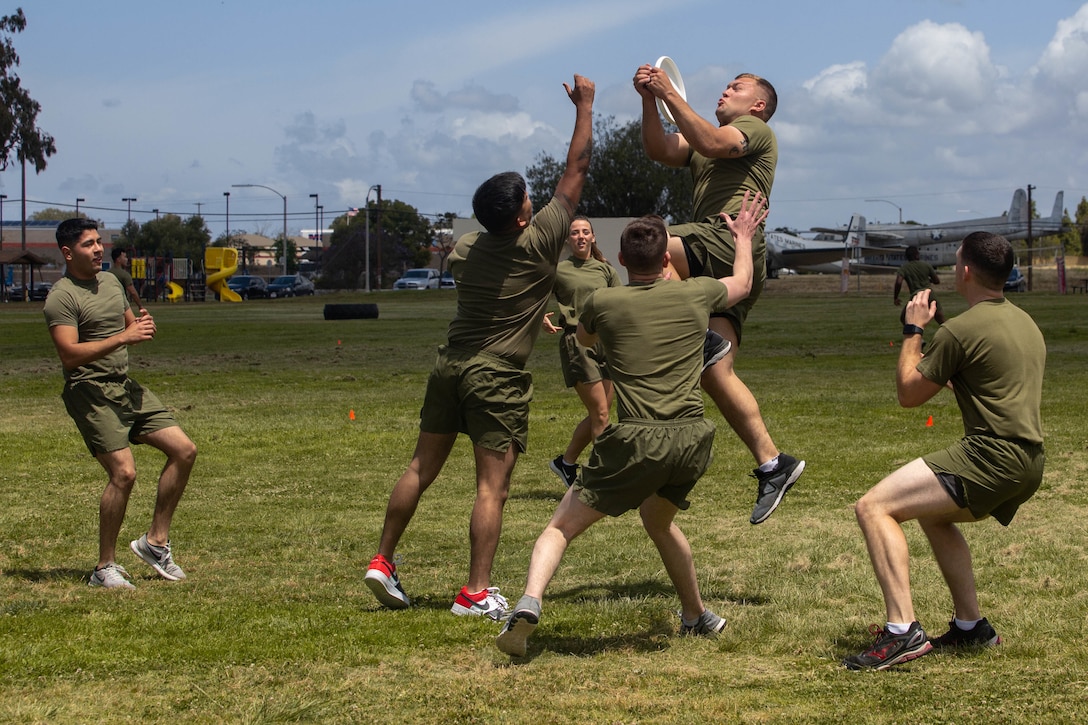 Marines with Headquarters and Headquarters Squadron participate in an ultimate Frisbee game on MCAS Miramar, Calif., May 17. The game was held to bring non-commissioned officers together to build unit cohesion. (U.S. Marine Corps photo by Cpl. Nadia J. Stark/released)