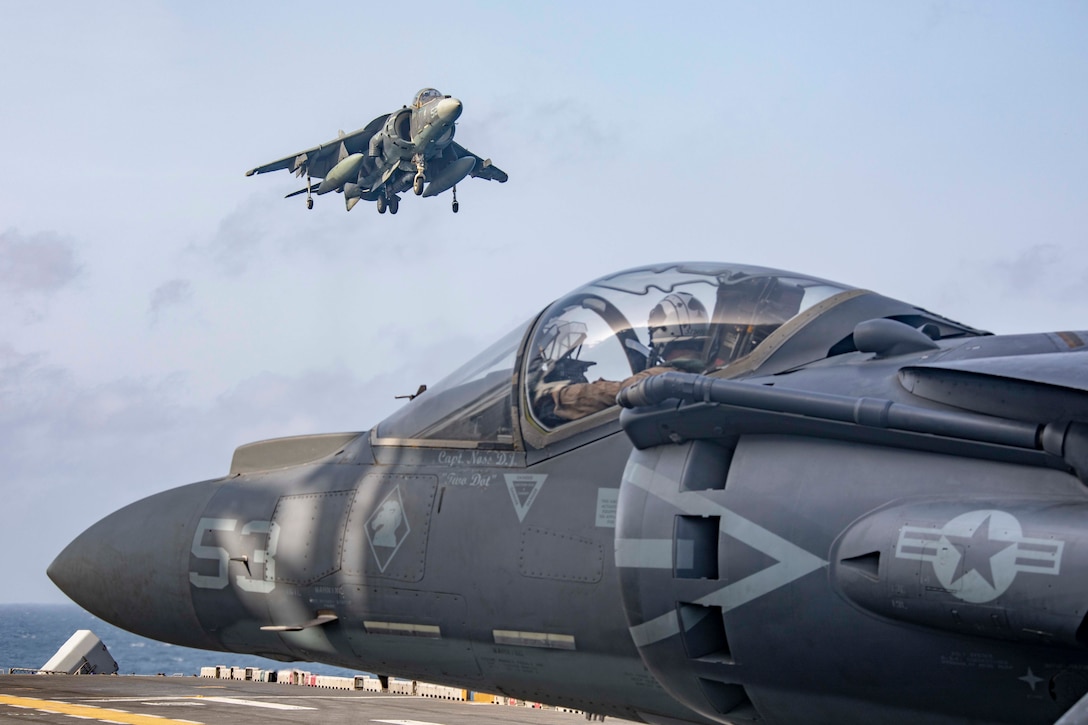 ARABIAN SEA (May 18, 2019) AV-8B Harriers return to the flight deck of the Wasp-class amphibious assault ship USS Kearsarge (LHD 3) after participating in an exercise with F/A-18E Super Hornets embarked aboard the Nimitz-class aircraft carrier USS Abraham Lincoln (CVN 72). The Abraham Lincoln Carrier Strike Group (ABECSG) and Kearsarge Amphibious Ready Group (KSGARG) are conducting joint operations in the U.S. 5th Fleet area of operations. The ABECSG and KSGARG, with the 22nd Marine Expeditionary Unit, are prepared to respond to contingencies and to defend U.S. forces and interests in the region. (U.S. Navy photo by Mass Communication Specialist 2nd Class Megan Anuci/Released)