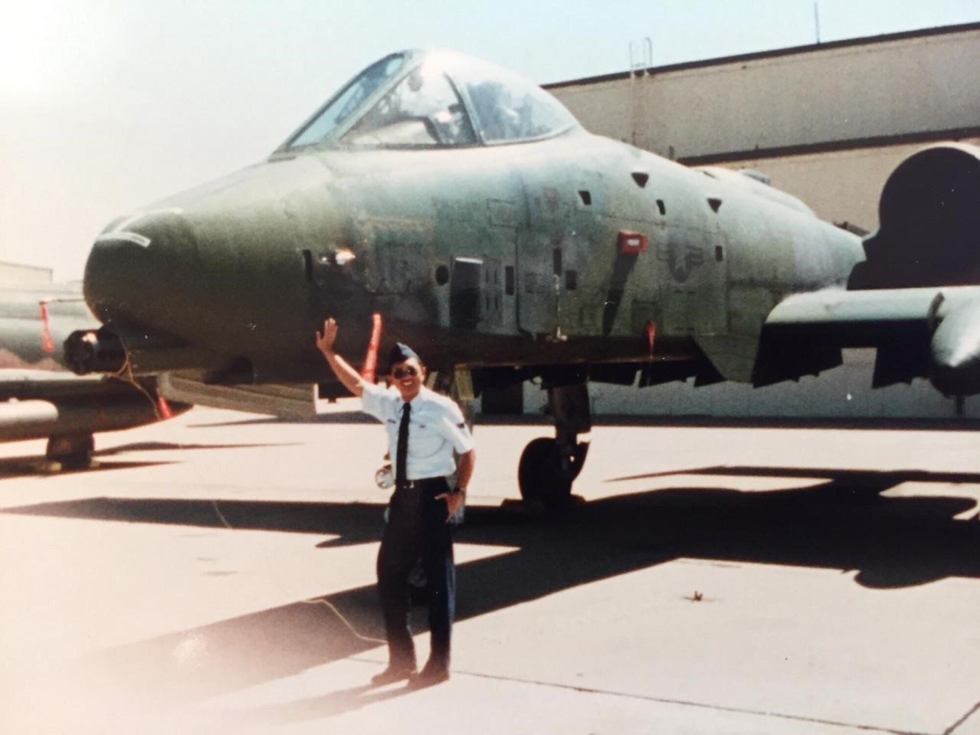 Joel Ambion retired U.S. Air Force veteran, father of 2nd Lt. Francis Ambion, 4th Space Launch Squadron Mission Integration Flight electrical engineer, poses next to an A-10 Thunderbolt II.
