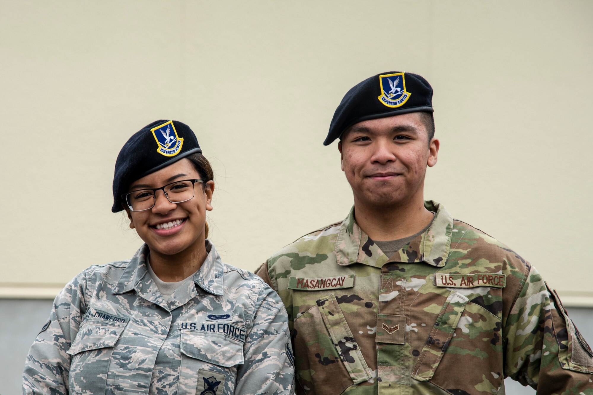 U.S. Air Force Airmen 1st Class Aliciana Infante-Crawford, left, and Jordan Masangcay, right, both 35th Security Forces Squadron armory journeymen, pause for a photo during Police Week 2019 at Misawa Air Base, Japan, May 15, 2019. Former President John F. Kennedy first established National Police Week in 1962 to pay tribute and honor those who made the ultimate sacrifice. The armory protects, secures and maintains over two-million dollars’ worth of weapons, ordinance, vehicles and other resources used in more than 2,500 ceremonies the honor guard performs yearly. (U.S. Air Force photo by Airman China Shock)