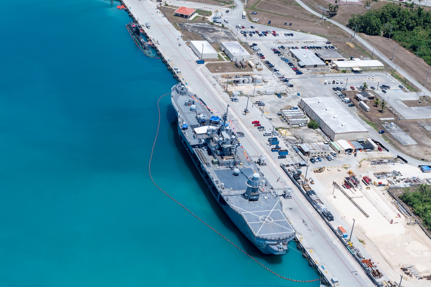 SANTA RITA, Guam (May 22, 2019) – An aerial view of The U.S. 7th Fleet flagship USS Blue Ridge (LCC 19) moored in Apra Harbor, in support of Pacific Vanguard (PACVAN), May 22. PACVAN is the first of its kind quadrilateral exercise between Australia, Japan, Republic of Korea, and U.S. Naval forces. Focused on improving the capabilities of participating countries to respond together to crisis and contingencies in the region, PACVAN prepares the participating maritime forces to operate as an integrated, capable, and potent allied force ready to respond to a complex maritime environment in the Indo-Pacific region.