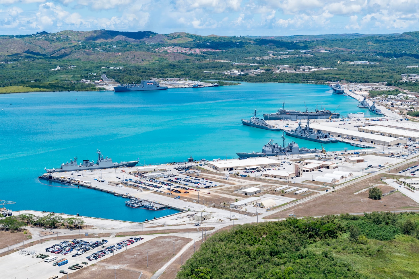 190522-N-LN093-1208

SANTA RITA, Guam (May 22, 2019) – An aerial view of U.S. Naval Base Guam shows U.S. Navy, Royal Australian Navy, Japan Maritime Self-Defense Force and the Republic of Korea Navy, vessels moored in Apra Harbor, in support of Pacific Vanguard (PACVAN), May 22. PACVAN is the first of its kind quadrilateral exercise between Australia, Japan, Republic of Korea, and U.S. Naval forces. Focused on improving the capabilities of participating countries to respond together to crisis and contingencies in the region, PACVAN prepares the participating maritime forces to operate as an integrated, capable, and potent allied force ready to respond to a complex maritime environment in the Indo-Pacific region.