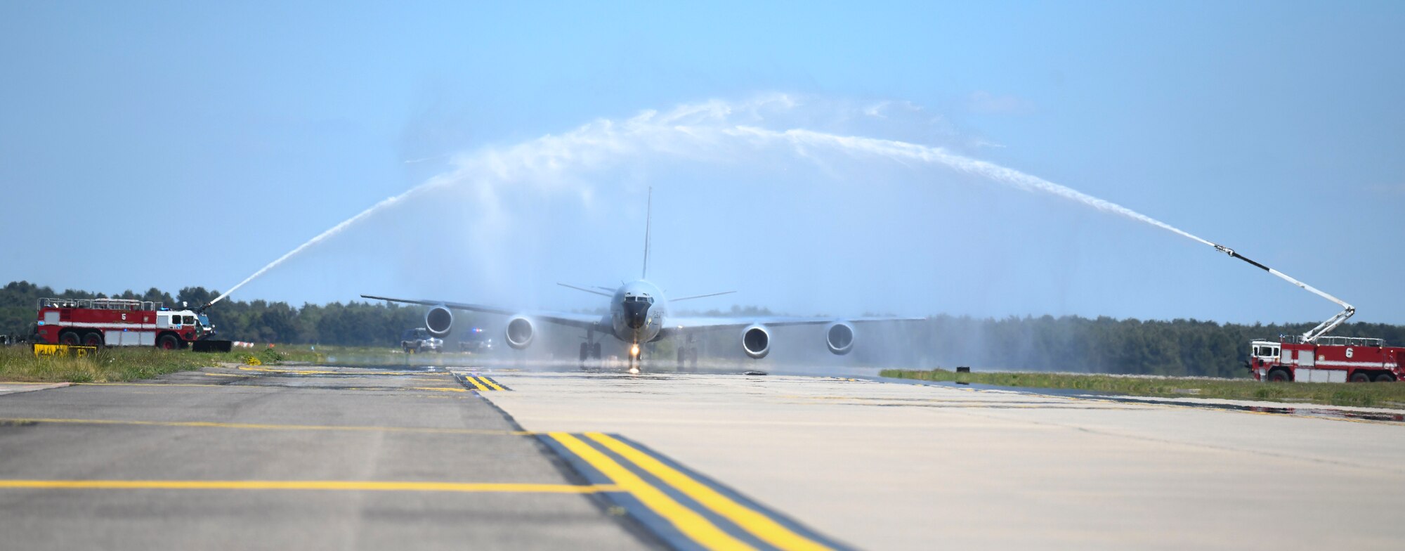 U.S. Air Force Col. Christopher Amrhein, 100th Air Refueling Wing commander, taxis through streams of water during a “fini-flight” at RAF Mildenhall, England, May 15, 2019. Amrhein celebrated his “fini-flight” with his family and wing. (U.S. Air Force photo by Senior Airman Alexandria Lee)