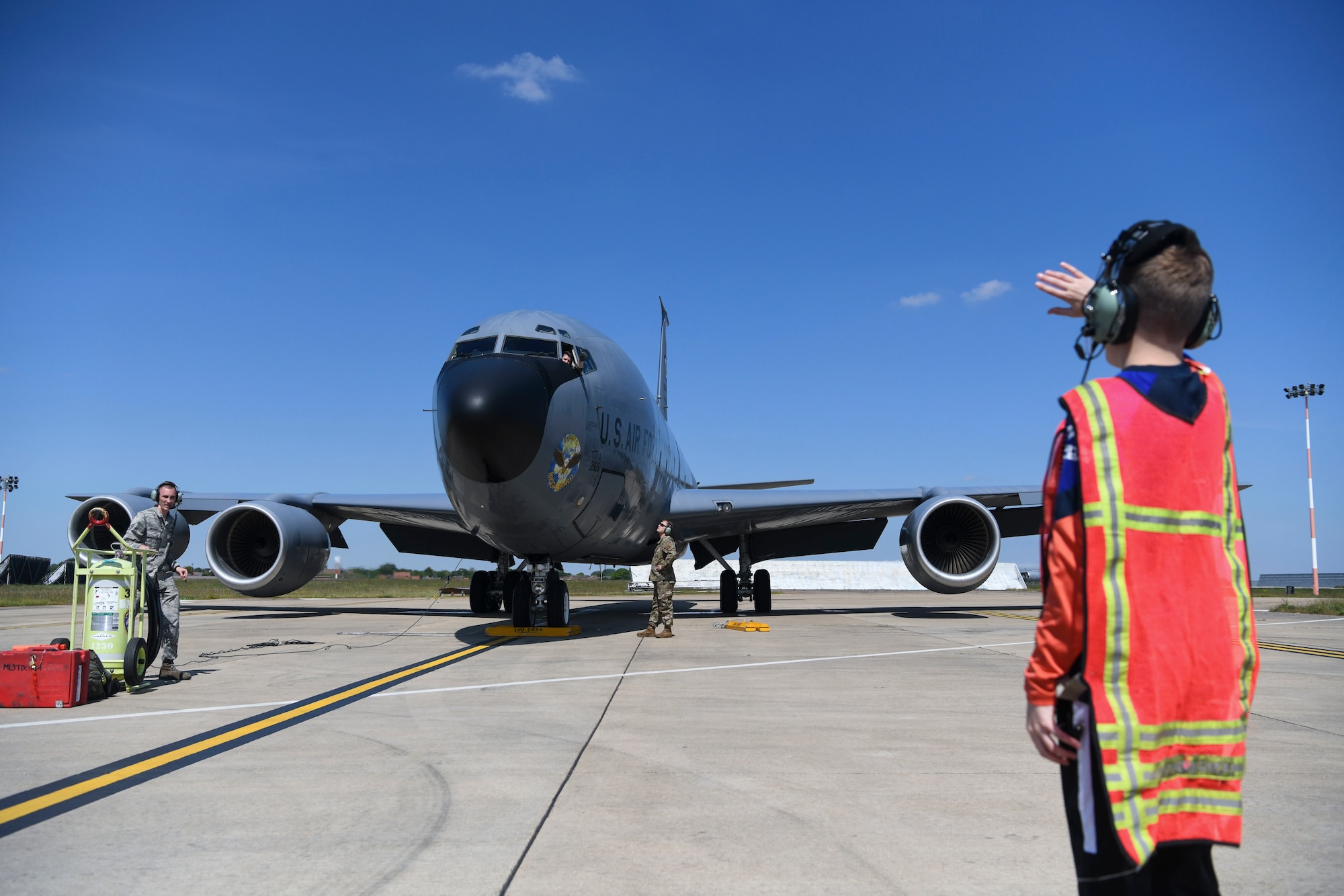 Refueling Wing Commander, marshals in his father’s KC-135 at RAF Mildenhall, England, May 15,2019. Amrhein celebrated his “fini-flight” following a two-year command with his friends and wing. (U.S. Air Force photo by Senior Airman Alexandria Lee)