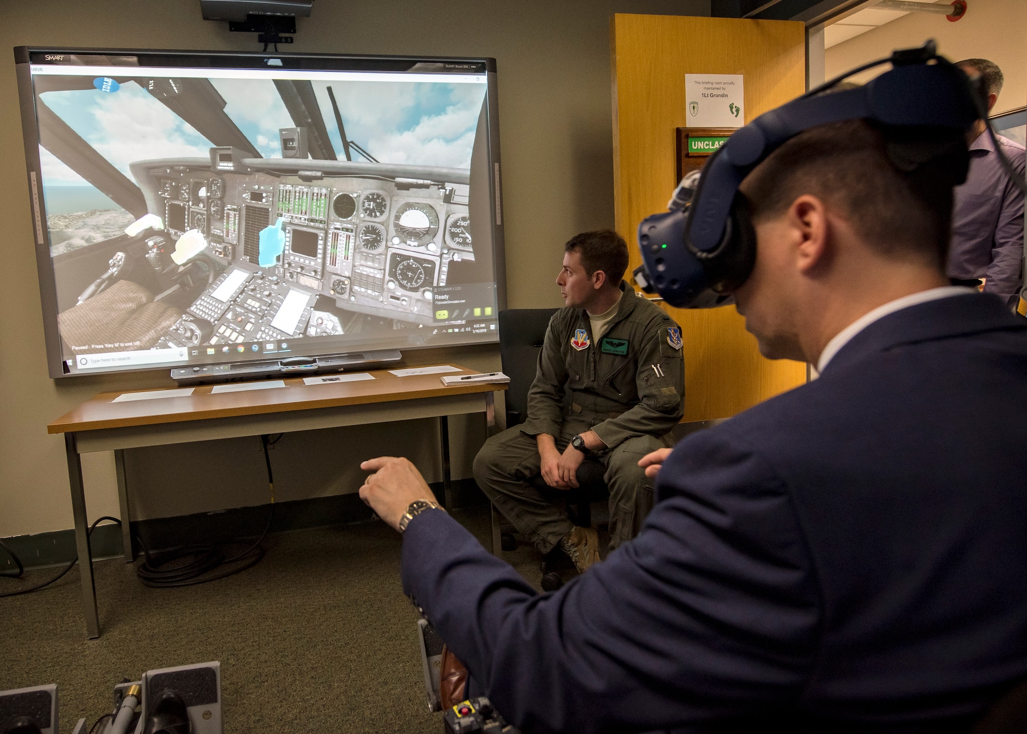 Dr. John Matyjas, science and technology advisor to Air Combat Command, tests the 41st Rescue Squadron’s (RQS) virtual reality flight simulator, May 16, 2019, at Moody Air Force Base, Ga. Matyjas and Dr. Donna Joyce visited the 41st RQS to tour and assess their VR simulator along with taking a fam flight on an HH-60G Pave Hawk. The visit is a part of an Air Force assessment of the possible implementation of VR in training. The 41st RQS VR flight simulator is an initiative that was selected at the Moody Air Force Base 2018 Spark Tank competition. (U.S. Air Force photo by Airman 1st Class Eugene Oliver)