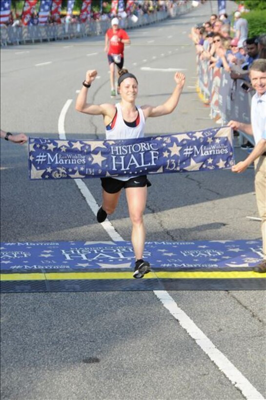 U.S. Marine Corps 1st Lt. Lindsay Carrick, 26, finished the 2019 Marine Corps Historic Half with purpose and pride as the first female finisher in a time of 1:25:02.