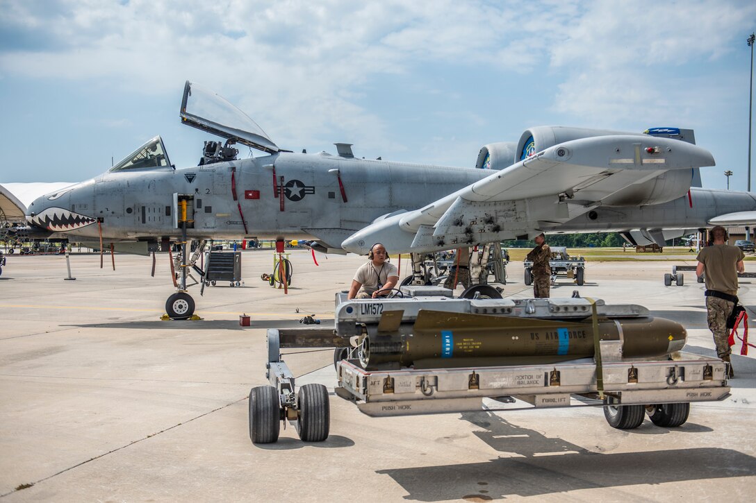 Senior Airman Paolo Niere, 74th Aircraft Maintenance Unit(AMU) load crew member, transports a munition May, 22, 2019, at Moody Air Force Base, Ga. The 74th AMU competed in the quarterly weapons load competition against the 75th AMU. (U.S. Air Force photo by Airman 1st Class Joseph P. Leveille)