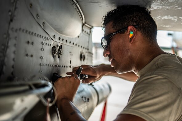 Airman 1st Class Carlos Carias-Rodriguez, 74th Aircraft Maintenance Unit(AMU) load crew member, tightens a bolt May, 22, 2019, at Moody Air Force Base, Ga. The 74th AMU competed in the quarterly weapons load competition against the 75th AMU. (U.S. Air Force photo by Airman 1st Class Joseph P. Leveille)